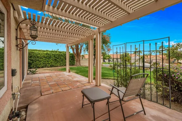 a view of porch with a bench