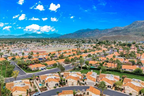 aerial view of residential houses with outdoor space