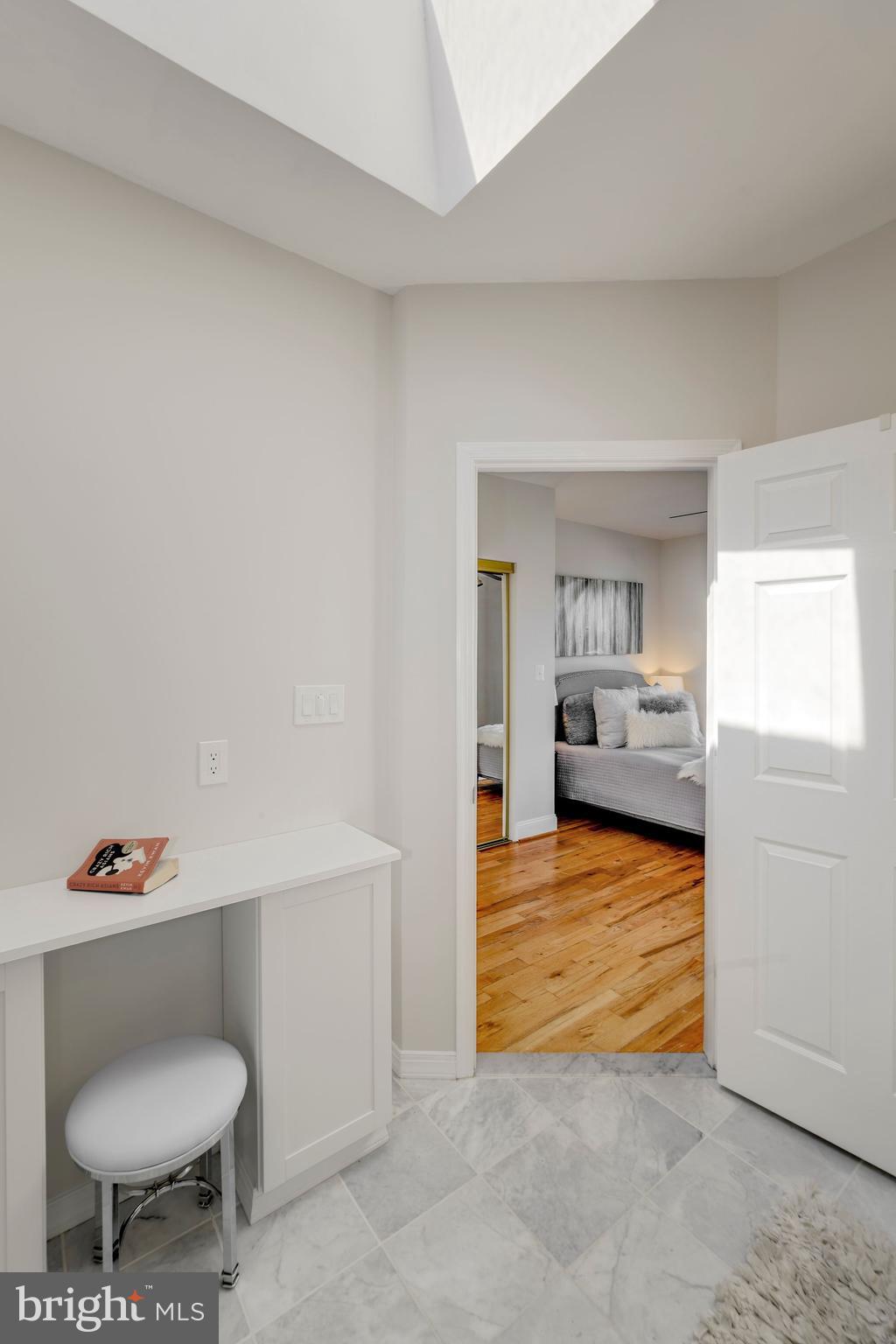 724 Columbia Road Northwest Washington, DC 20001 - Photo 16 of 33 Primary bath has vanity table & skylight