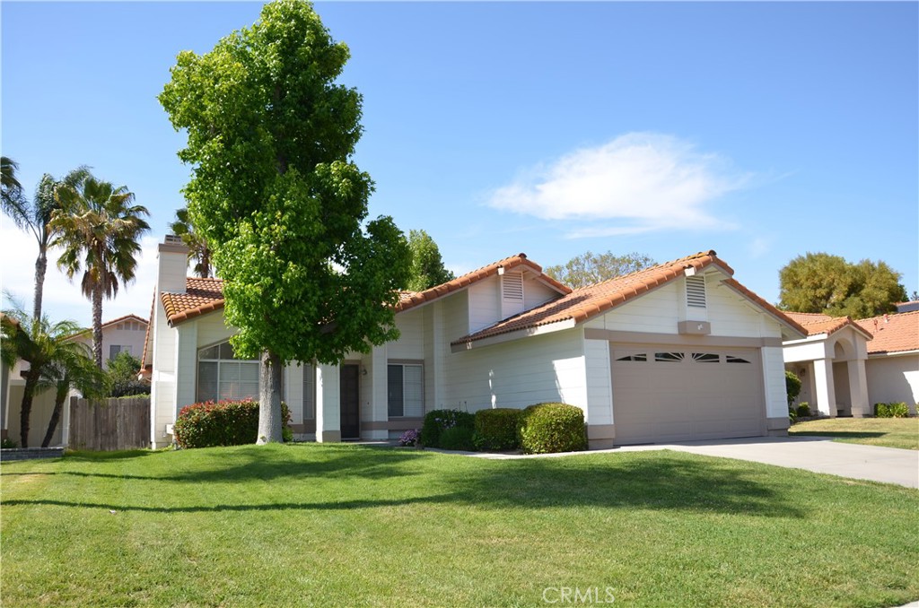 29620 Nightcrest Circle Temecula, CA 92591 - Photo 2 of 31 a front view of a house with a garden