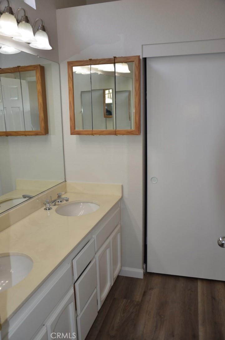 29620 Nightcrest Circle Temecula, CA 92591 - Photo 25 of 31 a bathroom with a sink and a mirror