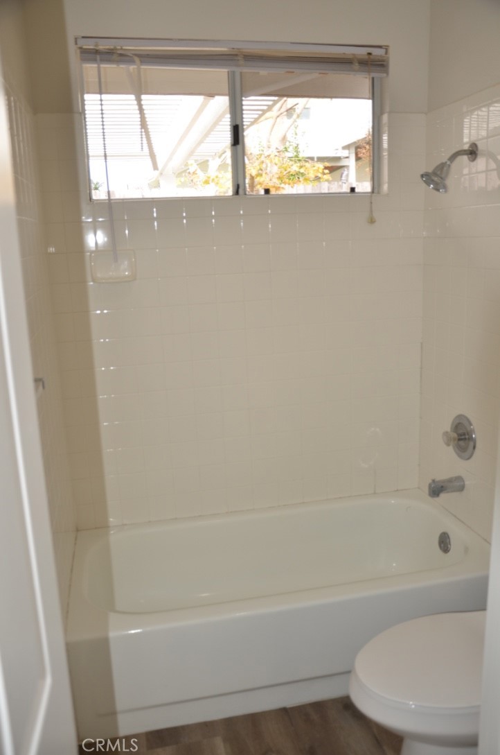 29620 Nightcrest Circle Temecula, CA 92591 - Photo 27 of 31 a bathroom with a toilet a bath tub and a shower