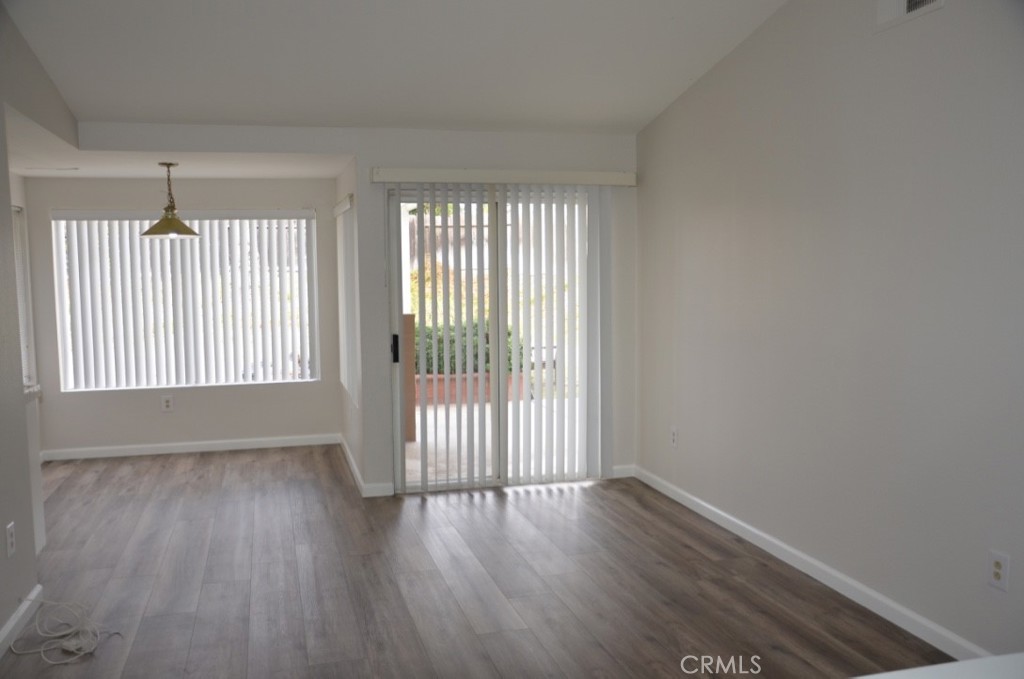29620 Nightcrest Circle Temecula, CA 92591 - Photo 8 of 31 wooden floor in an empty room with a window