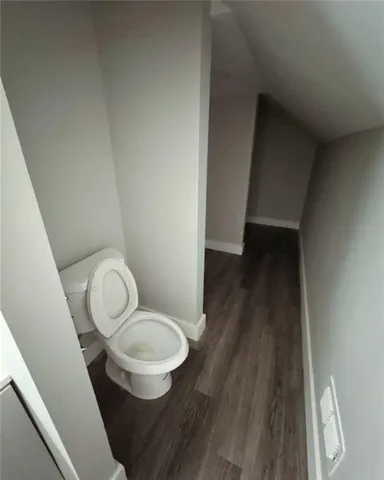 a bathroom with a toilet and a sink