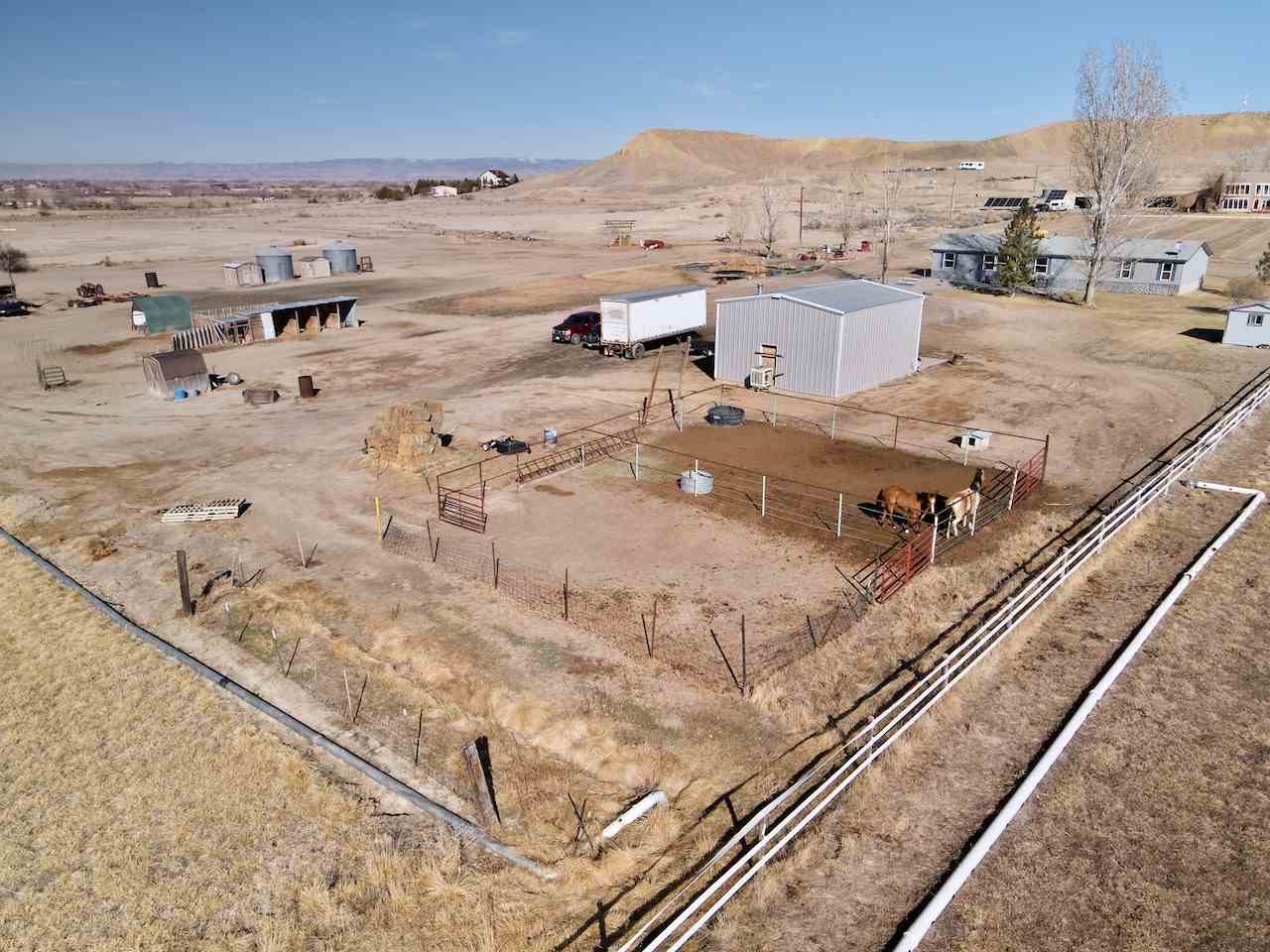 1675 North 1/2 Road Fruita, CO 81521 - Photo 29 of 31 a view of a terrace with wooden floor