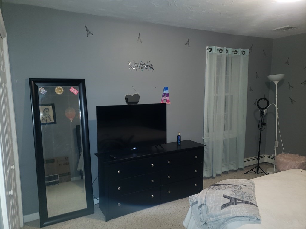 191 Holmes Road North Attleboro, MA 02760 - Photo 15 of 31 a bedroom with a bed and a dresser