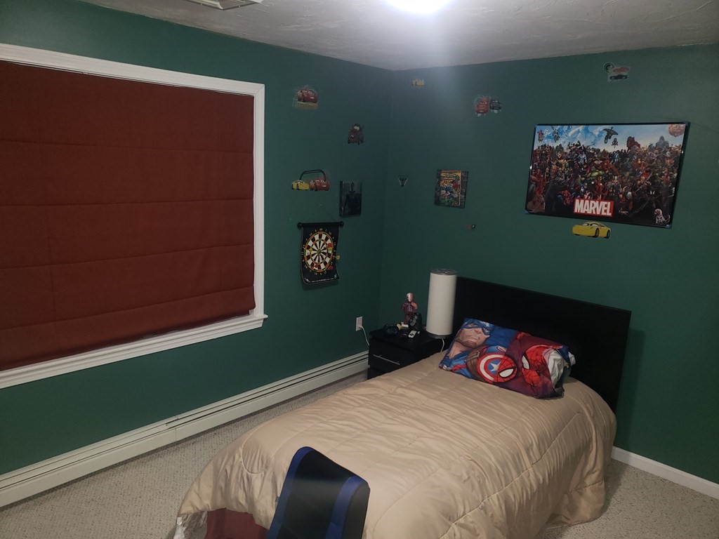 191 Holmes Road North Attleboro, MA 02760 - Photo 16 of 31 a bedroom with a bed and a window