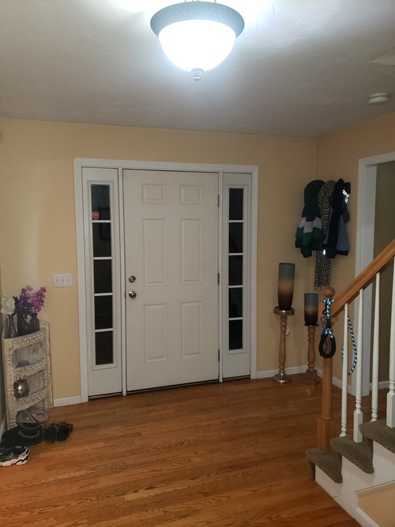 191 Holmes Road North Attleboro, MA 02760 - Photo 2 of 31 a view of an empty room with stairs and ventilation