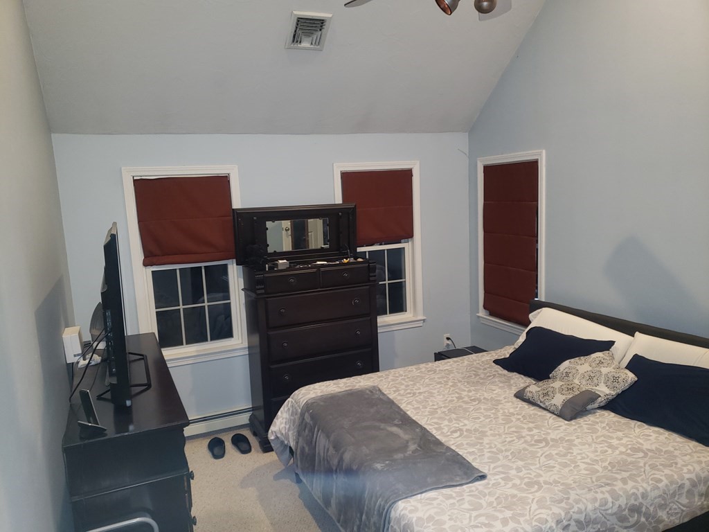 191 Holmes Road North Attleboro, MA 02760 - Photo 22 of 31 a bedroom with a bed and a television