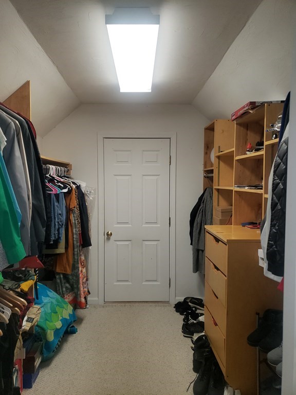 191 Holmes Road North Attleboro, MA 02760 - Photo 24 of 31 a view of walk in closet with clothes and shoes