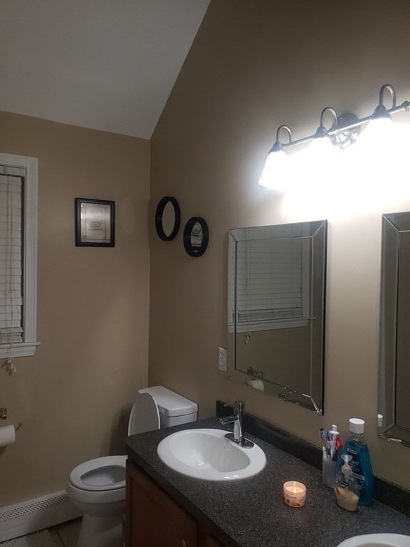 191 Holmes Road North Attleboro, MA 02760 - Photo 26 of 31 a bathroom with a toilet sink and mirror