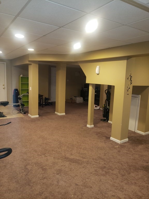 191 Holmes Road North Attleboro, MA 02760 - Photo 28 of 31 an empty room with furniture and a window