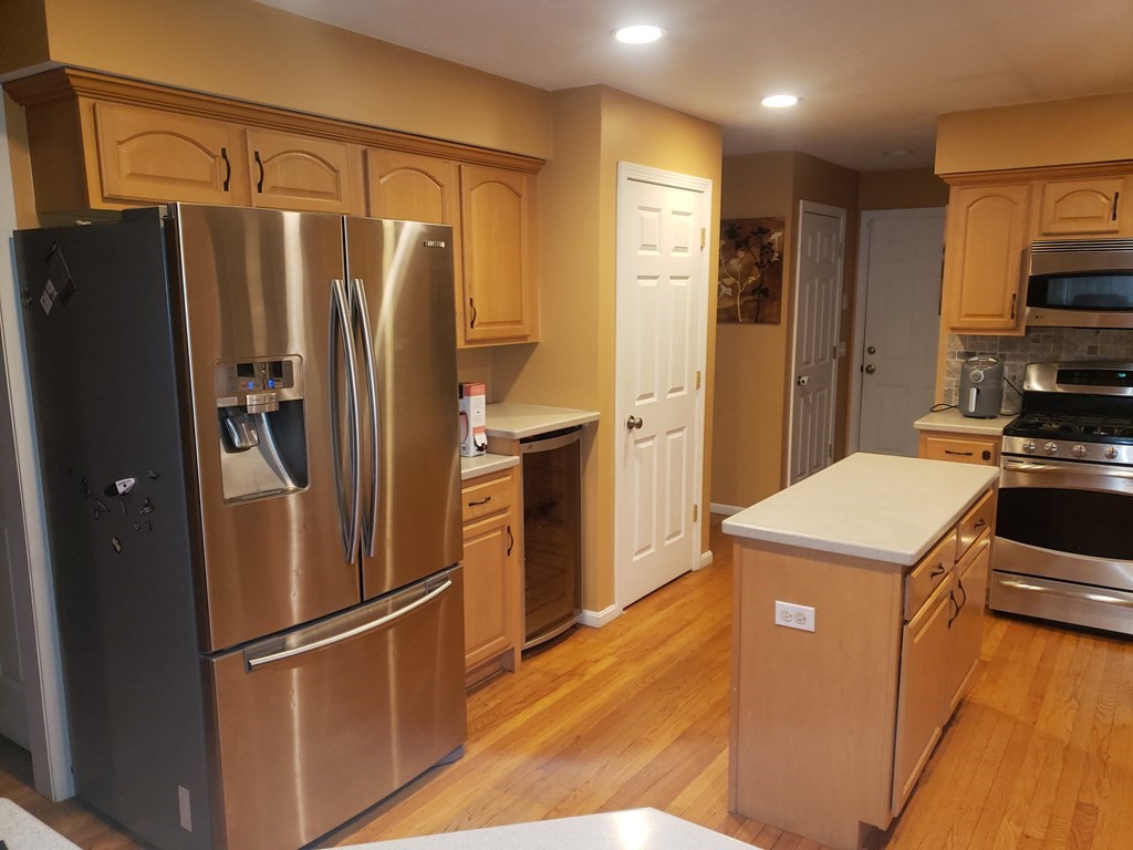 191 Holmes Road North Attleboro, MA 02760 - Photo 6 of 31 a kitchen with stainless steel appliances a refrigerator a stove a sink and a refrigerator