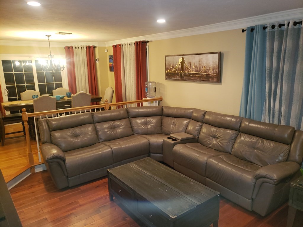 191 Holmes Road North Attleboro, MA 02760 - Photo 9 of 31 a living room with furniture and a large mirror