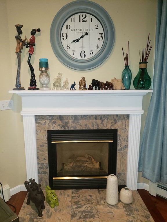 191 Holmes Road North Attleboro, MA 02760 - Photo 10 of 31 a view of living room with furniture and a fireplace
