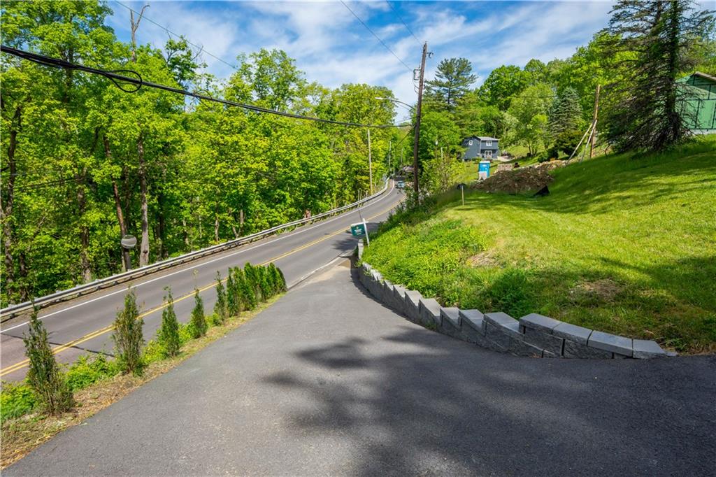 933 Boyce Road Bridgeville, PA 15017 - Photo 34 of 36 a view of a street with a wooden fence
