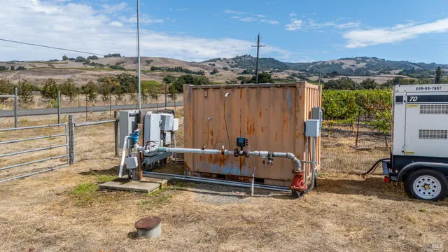 a view of a lake with a yard