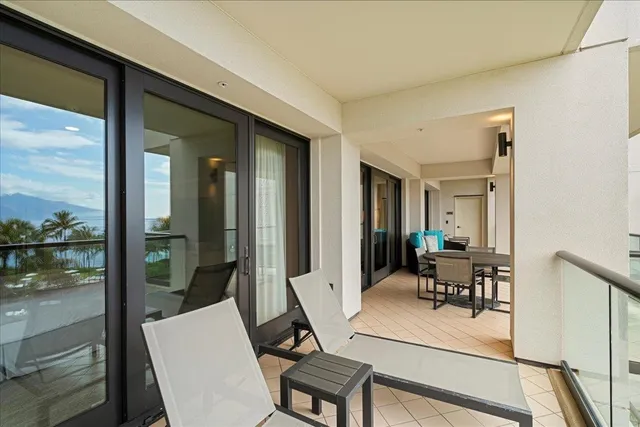 a view of a living room and dining room