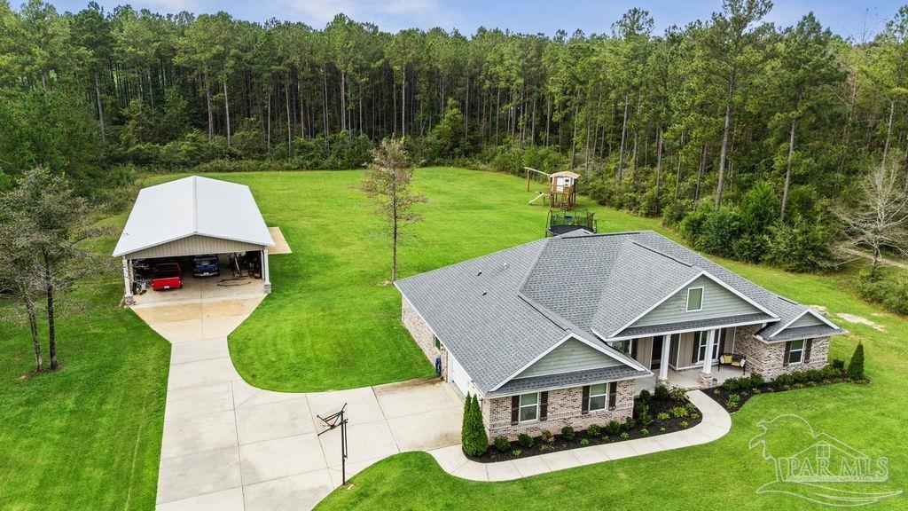 1571 Annie Penton Road Jay, FL 32565 - Photo 17 of 46 an aerial view of a house