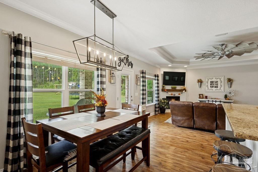 1571 Annie Penton Road Jay, FL 32565 - Photo 19 of 46 a view of a dining room with furniture window and outside view