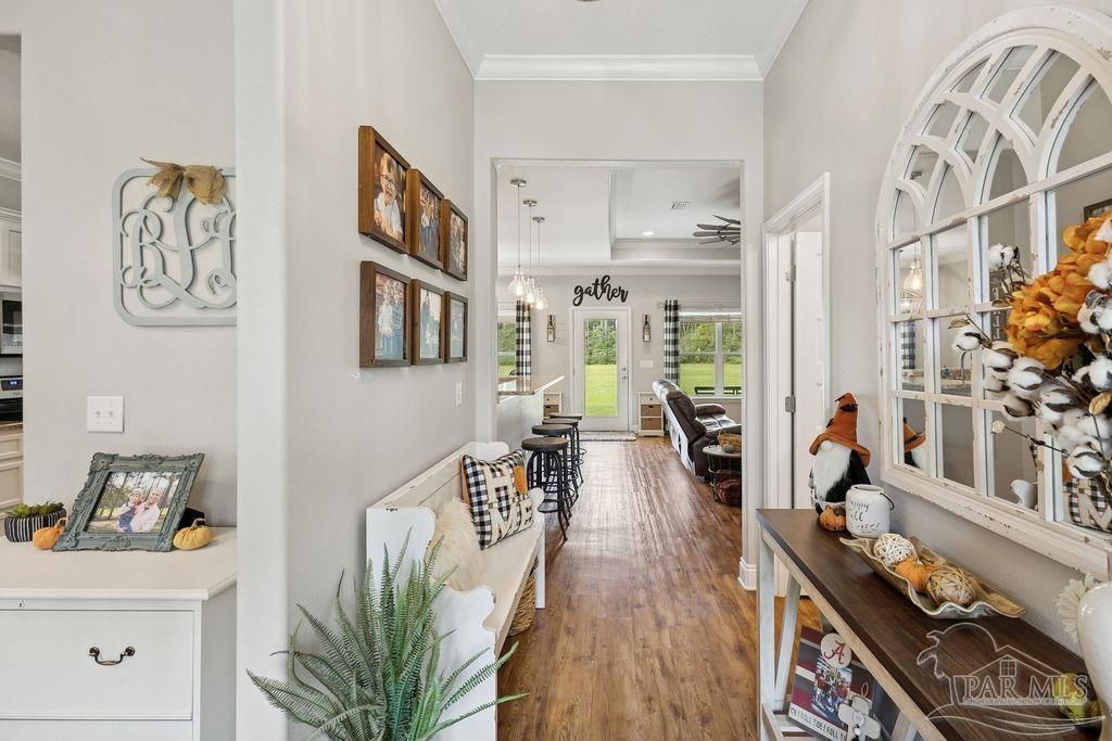 1571 Annie Penton Road Jay, FL 32565 - Photo 24 of 46 a living room with furniture and wooden floor