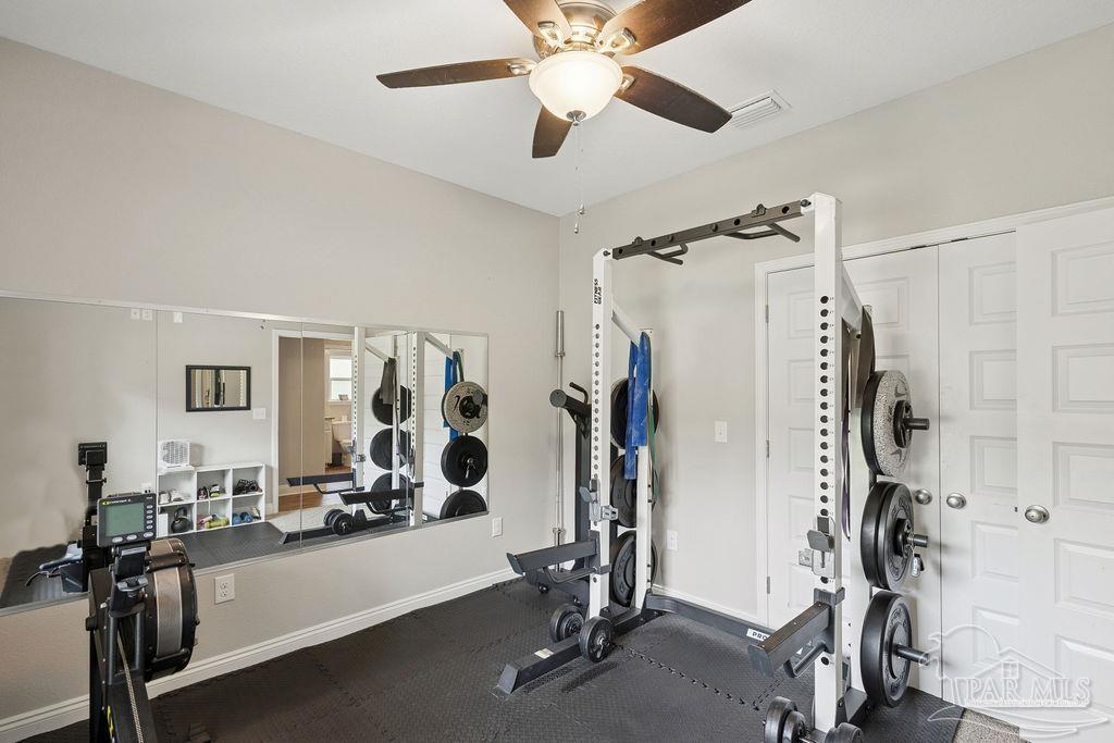 1571 Annie Penton Road Jay, FL 32565 - Photo 31 of 46 a view of a room with gym equipment