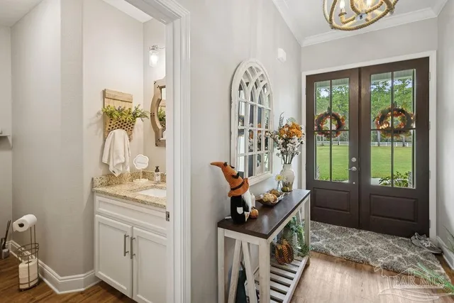 a front view of house with yard outdoor seating and green space