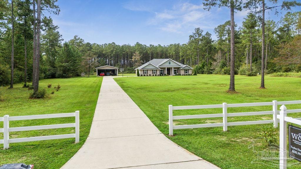1571 Annie Penton Road Jay, FL 32565 - Photo 4 of 46 a view of a park with large trees