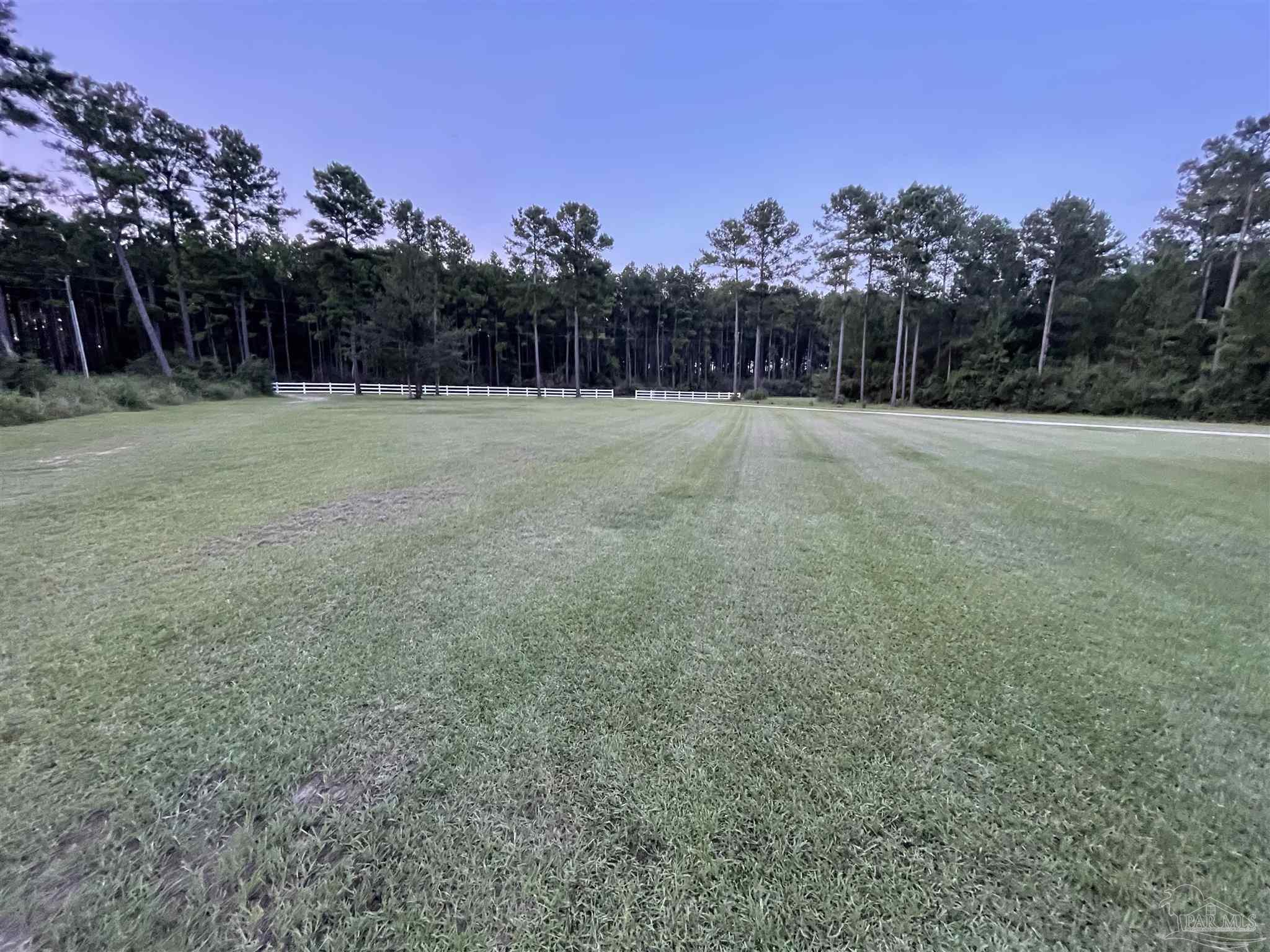 1571 Annie Penton Road Jay, FL 32565 - Photo 42 of 46 a view of outdoor space with trees all around