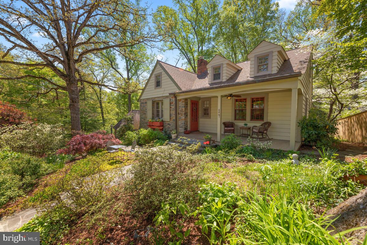 17 Sunnyside Road Silver Spring, MD 20910 - Photo 1 of 50 a front view of a house with a yard and potted plants