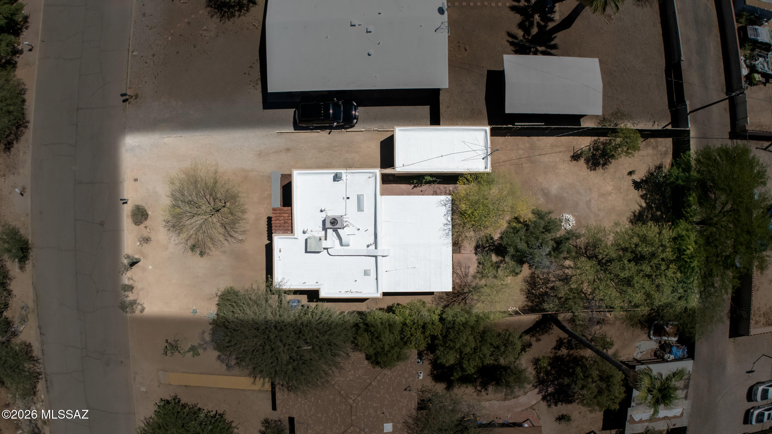 1412 East Spring Street Tucson, AZ 85719 - Photo 42 of 43 an aerial view of residential house with outdoor space and parking