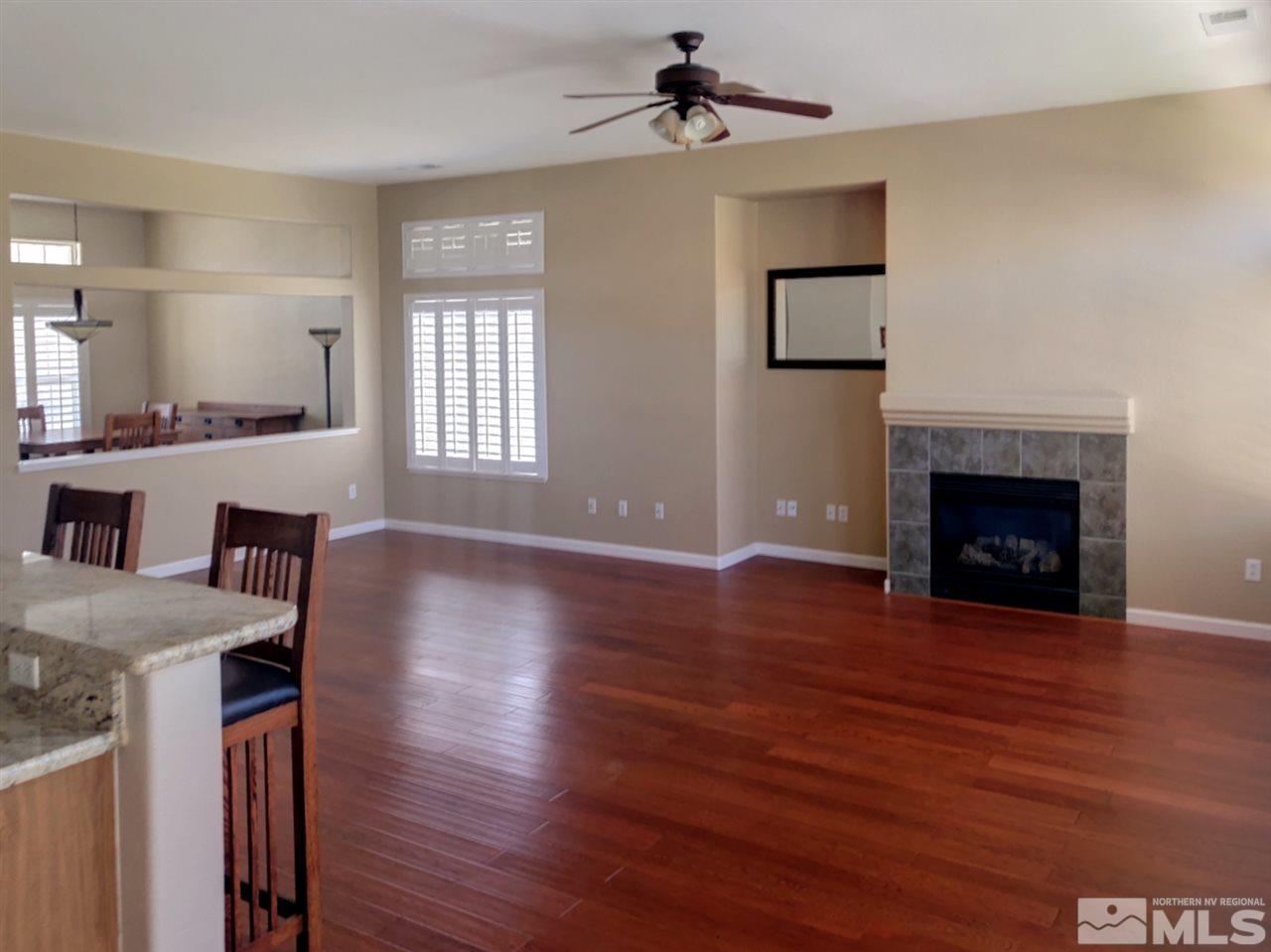 1861 Arboleda Court Reno, NV 89521 - Photo 10 of 15 a view of a livingroom with furniture and a fireplace