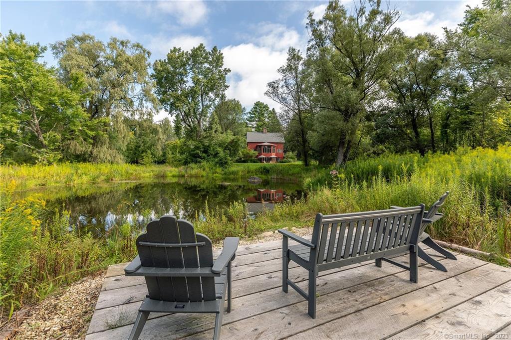 a view of a lake with a deck
