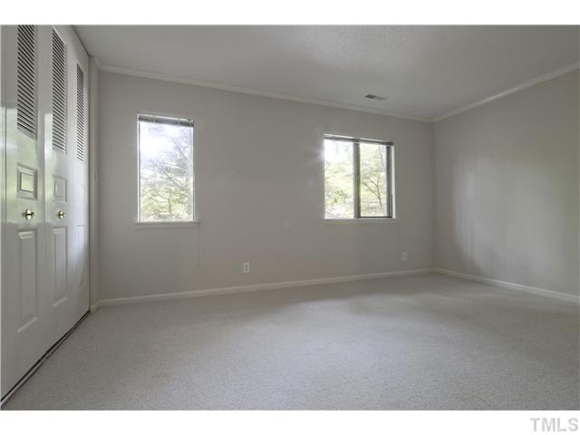 3080 Colony Road, Unit D Durham, NC 27705 - Photo 11 of 12 a view of an empty room with a window