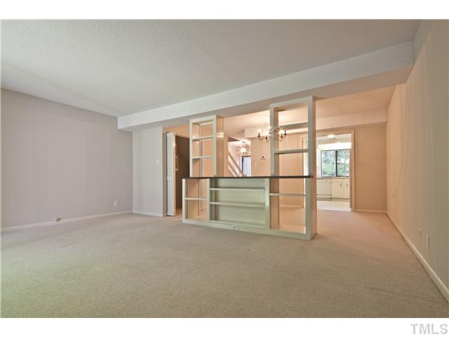 3080 Colony Road, Unit D Durham, NC 27705 - Photo 4 of 12 a view of an empty room with a window