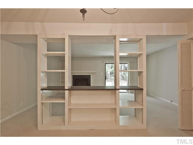 3080 Colony Road, Unit D Durham, NC 27705 - Photo 7 of 12 a room with wooden floor and windows