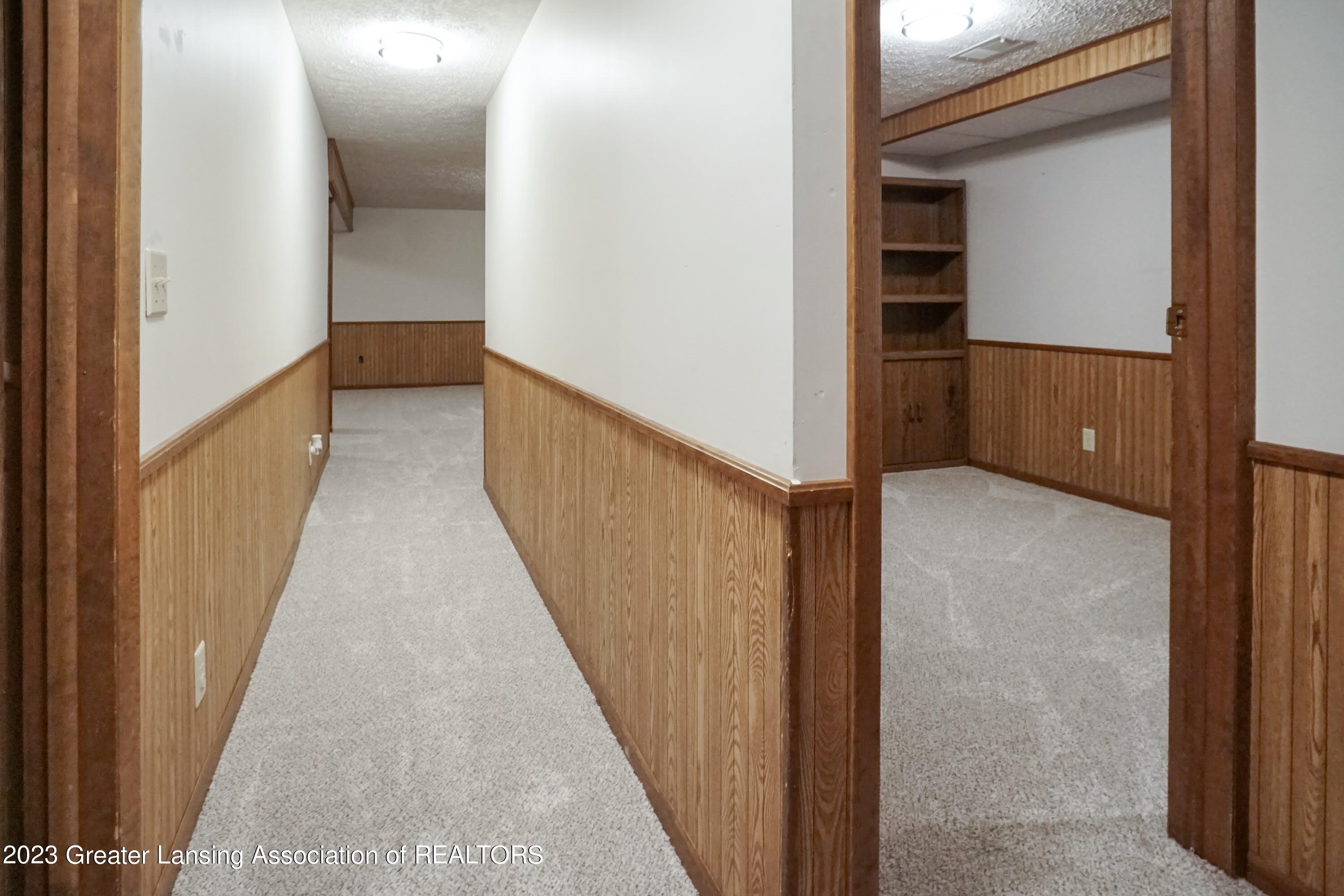 5872 Green Road Haslett, MI 48840 - Photo 22 of 31 Basement Hallway