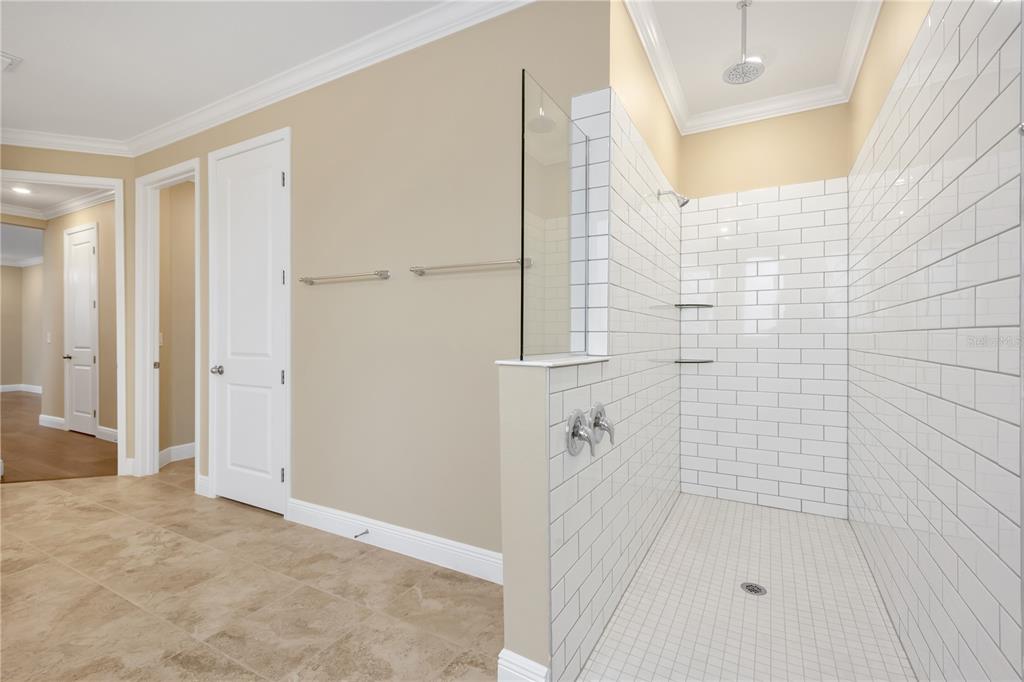 2132 Keystone Pass Boulevard Minneola, FL 34715 - Photo 18 of 52 a bathroom with a shower