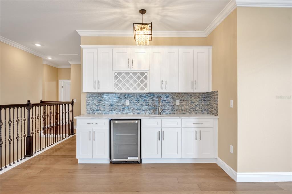 2132 Keystone Pass Boulevard Minneola, FL 34715 - Photo 31 of 52 a kitchen with granite countertop a stove and a sink