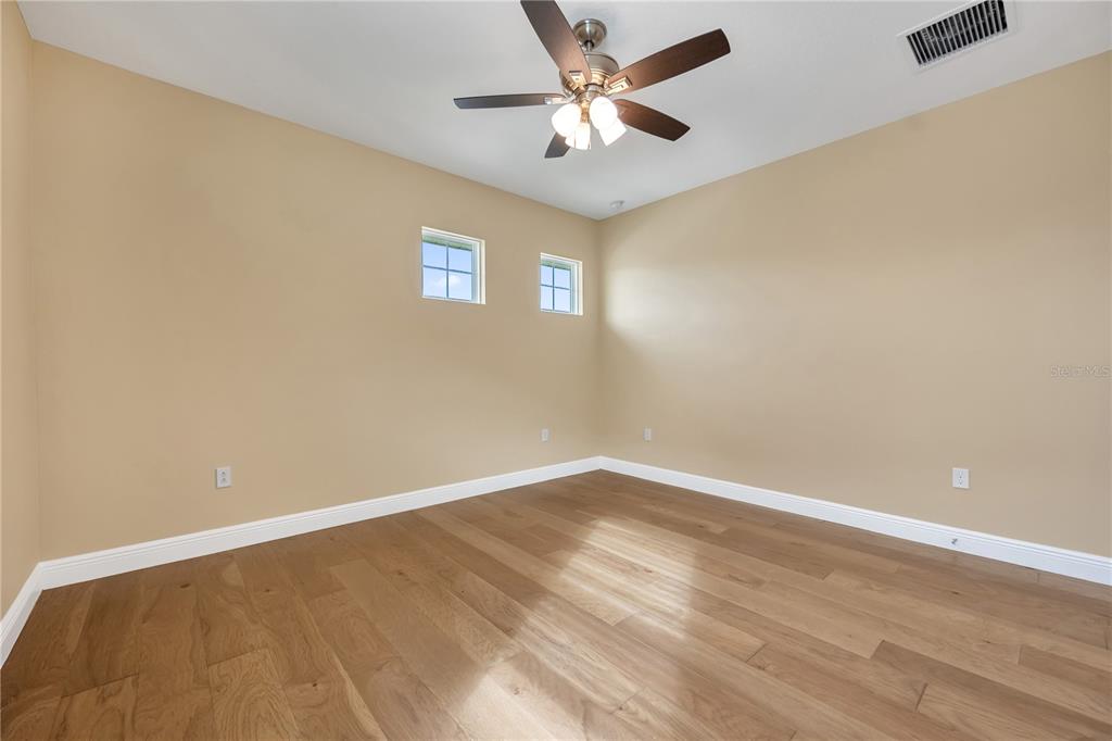 2132 Keystone Pass Boulevard Minneola, FL 34715 - Photo 37 of 52 wooden floor in an empty room