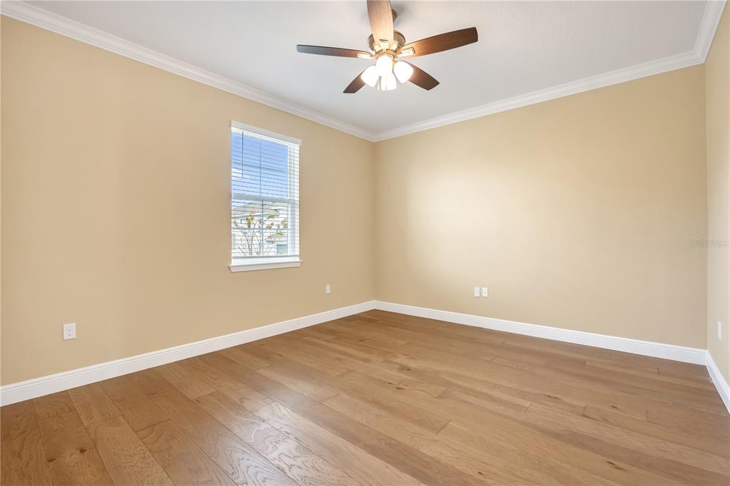 2132 Keystone Pass Boulevard Minneola, FL 34715 - Photo 39 of 52 an empty room with a window and a fan