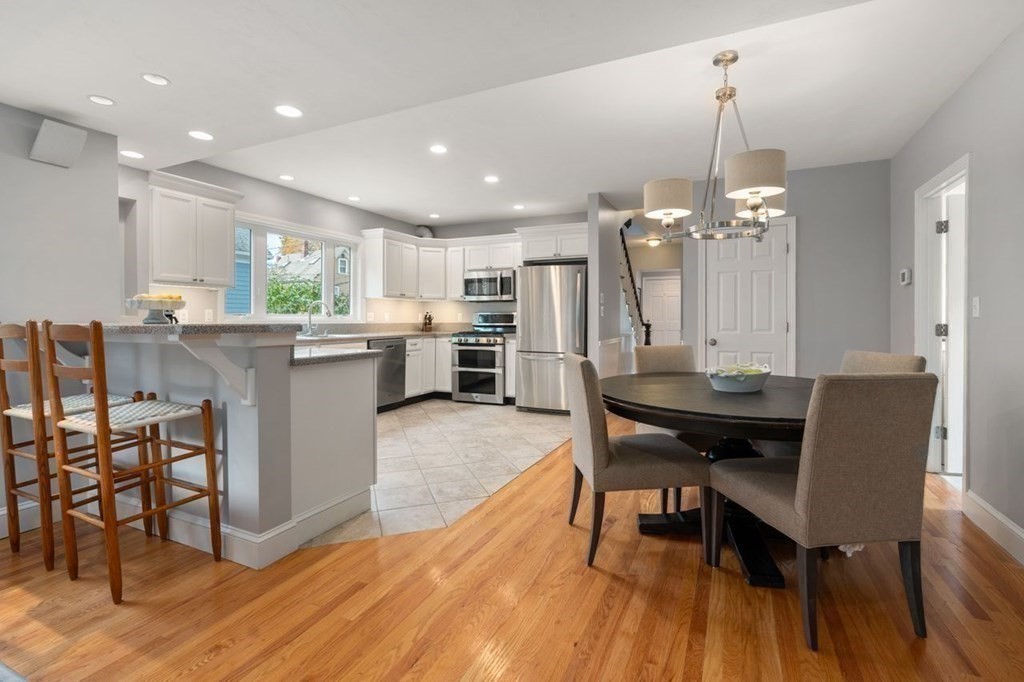 6 Willow Street Natick, MA 01760 - Photo 13 of 32 a view of a dining room with furniture and wooden floor