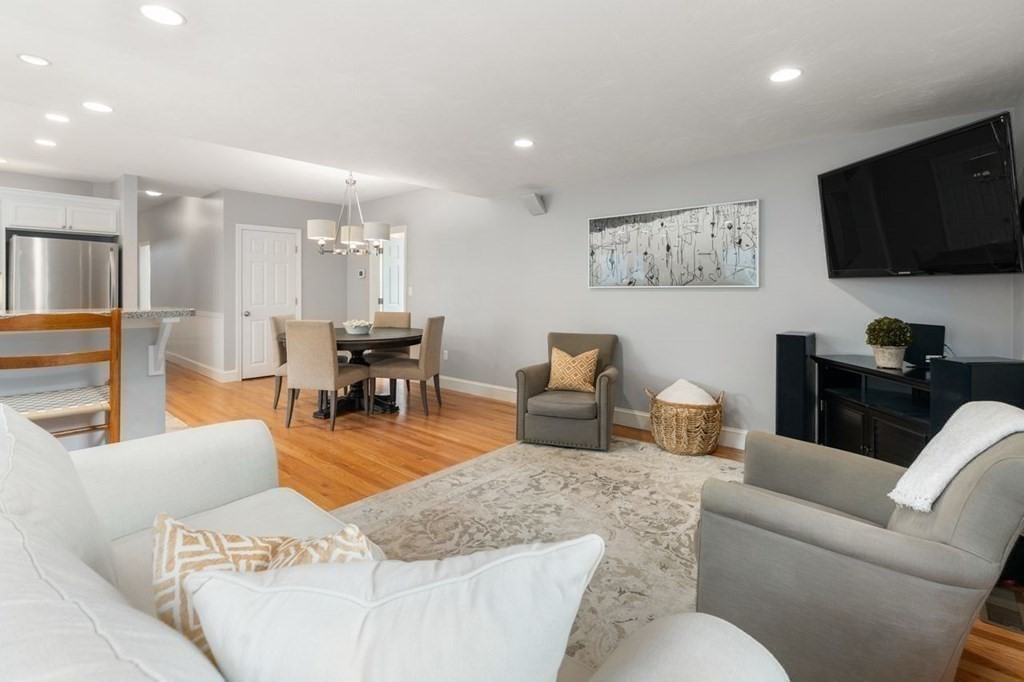 6 Willow Street Natick, MA 01760 - Photo 14 of 32 a living room with furniture and a flat screen tv