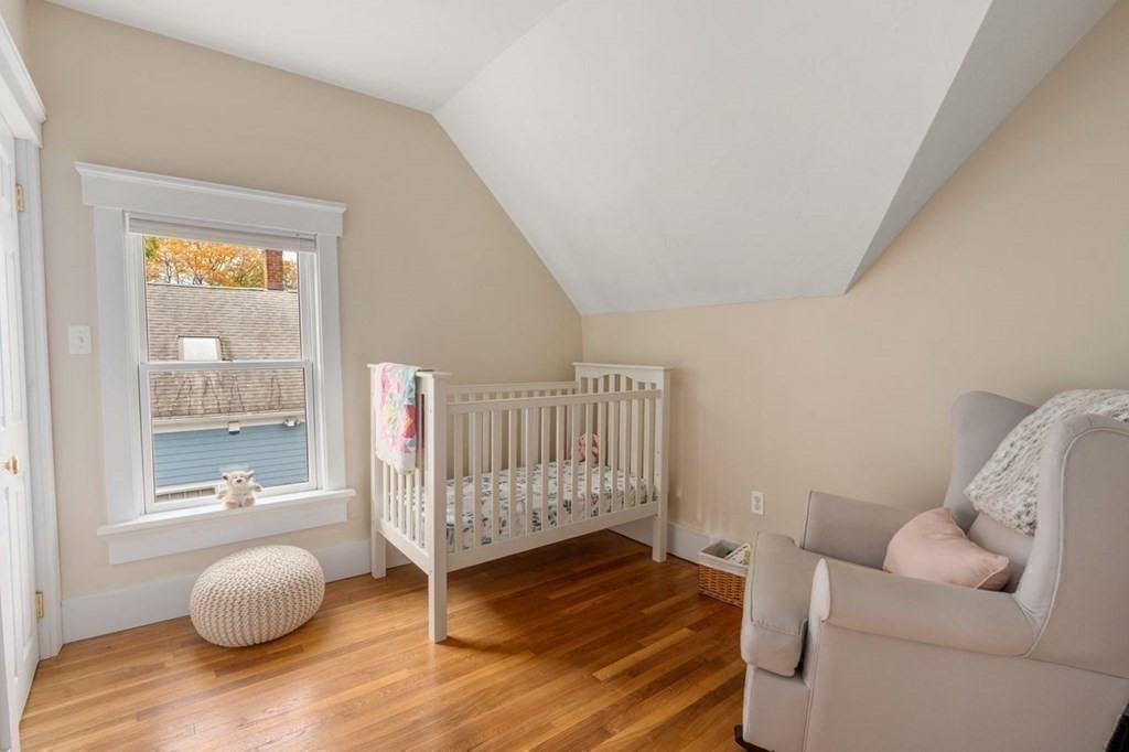6 Willow Street Natick, MA 01760 - Photo 30 of 32 a bedroom with furniture and a window