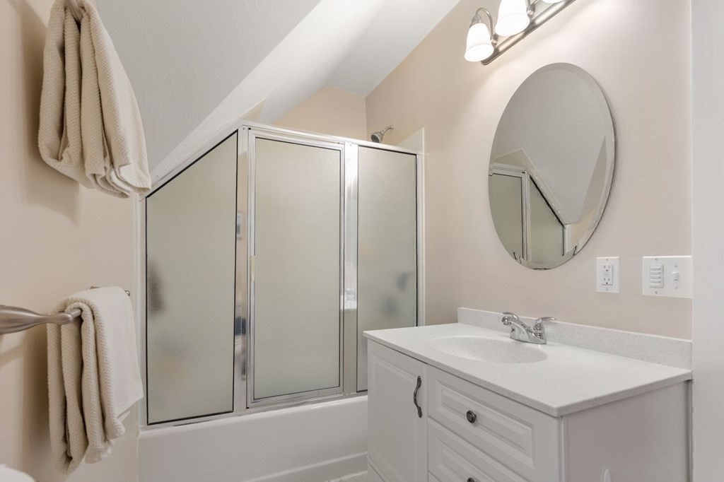 6 Willow Street Natick, MA 01760 - Photo 31 of 32 a bathroom with a sink and a mirror