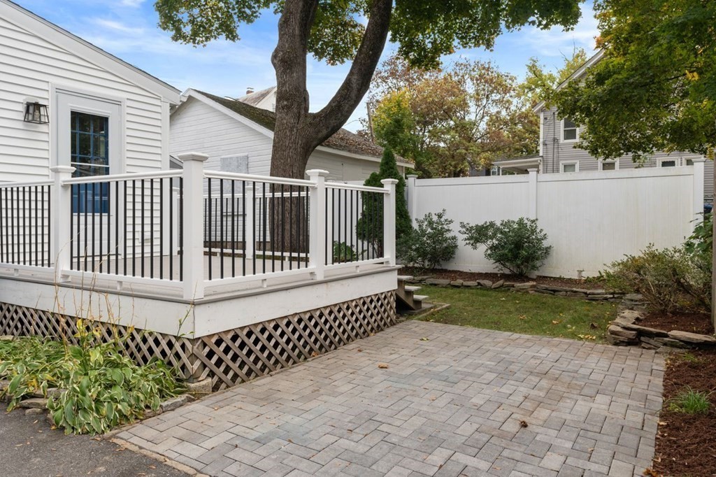 6 Willow Street Natick, MA 01760 - Photo 4 of 32 a view of a porch with a yard