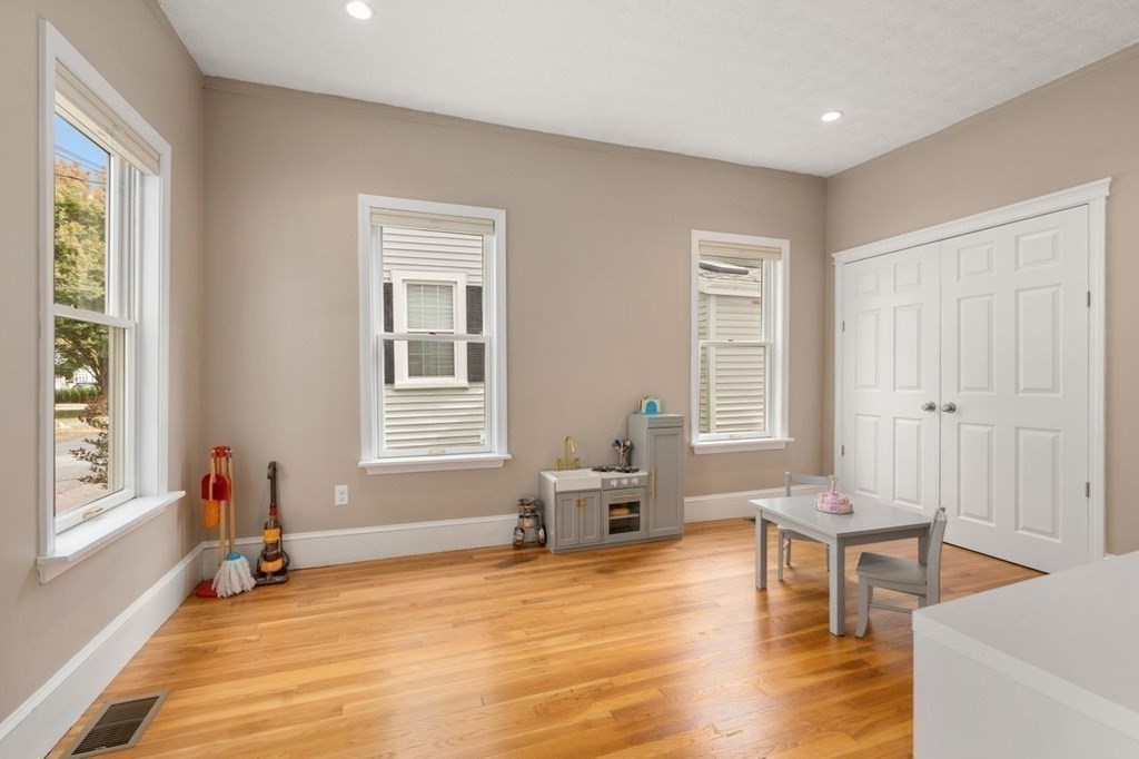 6 Willow Street Natick, MA 01760 - Photo 8 of 32 a living room with furniture and a window