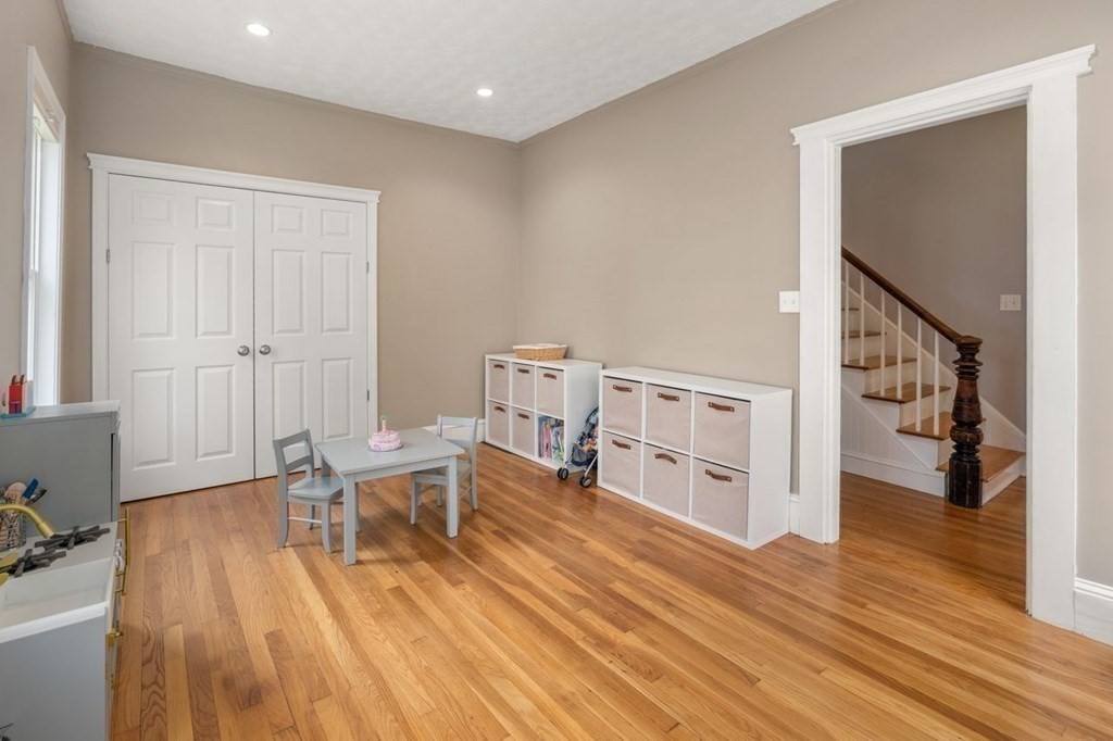 6 Willow Street Natick, MA 01760 - Photo 9 of 32 a living room with furniture and a wooden floor