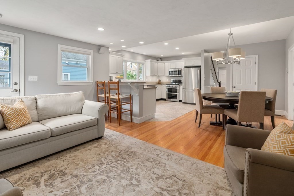 6 Willow Street Natick, MA 01760 - Photo 10 of 32 a living room with furniture and kitchen view