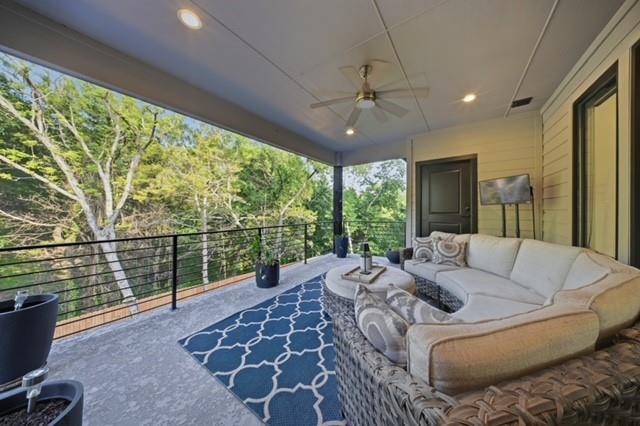 522 South Clark Road Cedar Hill, TX 75104 - Photo 26 of 31 a living room with furniture and a floor to ceiling window